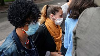 Valerie Bacot, centre, arrives with relatives at the Chalon-sur-Saone courthouse on Friday.