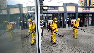 Employees of the Federal State Center for Special Risk Rescue Operations of Russia Emergency Situations, disinfect a platform in Moscow. 25 June 2021