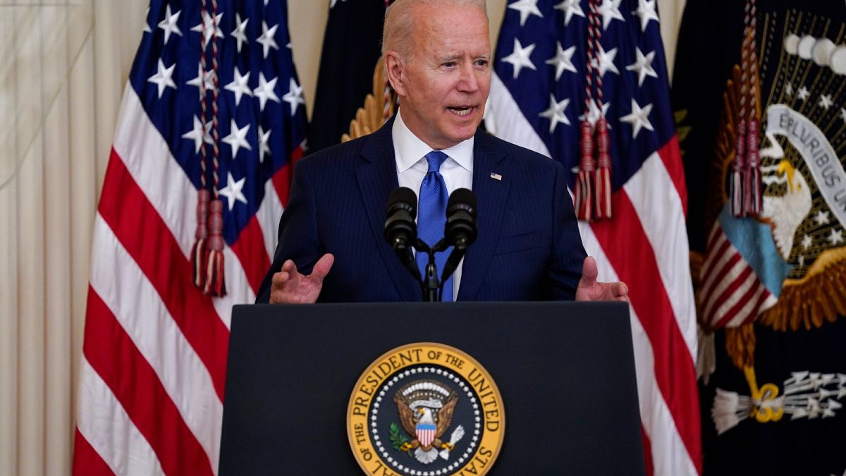 US President Joe Biden speaks during an event to commemorate Pride Month, in the East Room of the White House in Washington.