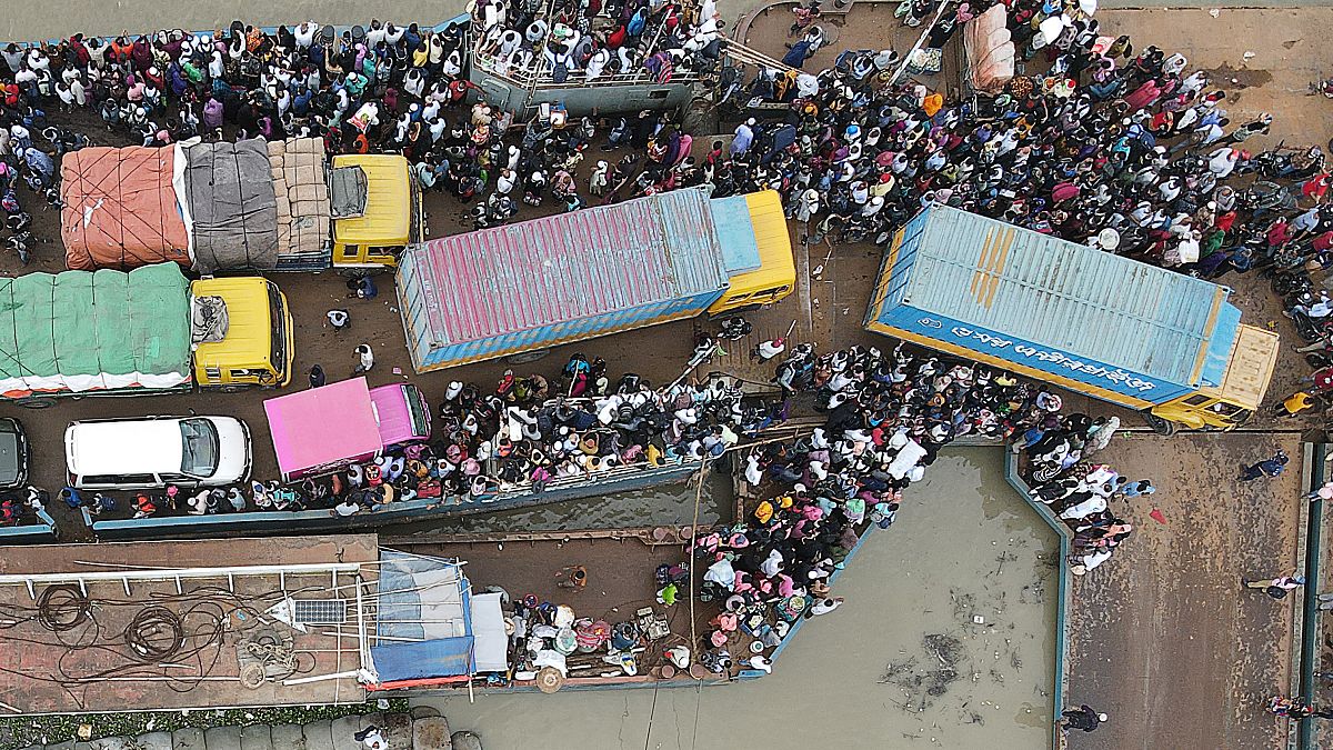 Migrant workers flee capital as Bangladesh tightens Covid lockdown