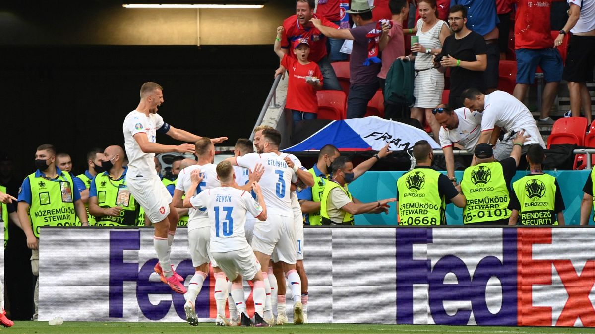 Czech Republic players celebrate after Czech Republic's Tomas Holes scored his side's opening goal.