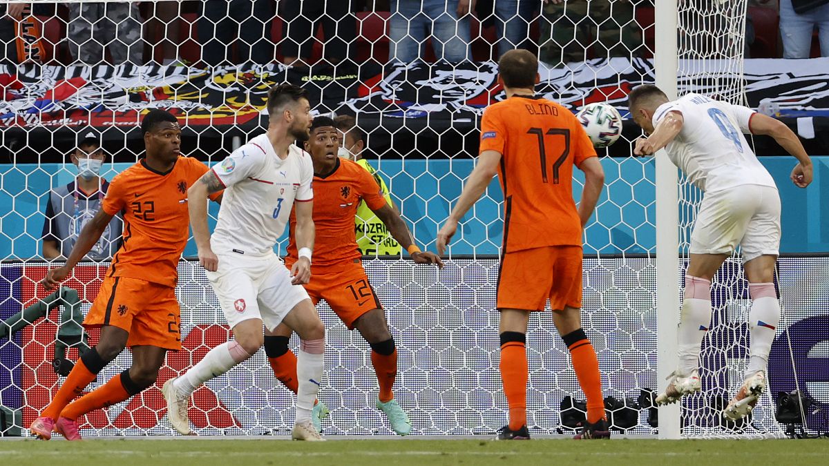Czech Republic's Tomas Holes, right, scores his sides first goal during the Euro 2020 round of 16 match with Netherlands in Budapest, Hungary, Sunday, June 27, 2021.