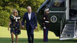 President Joe Biden and first lady Jill Biden walk on the South Lawn of the White House after stepping off Marine One, Sunday, June 27, 2021, in Washington. 