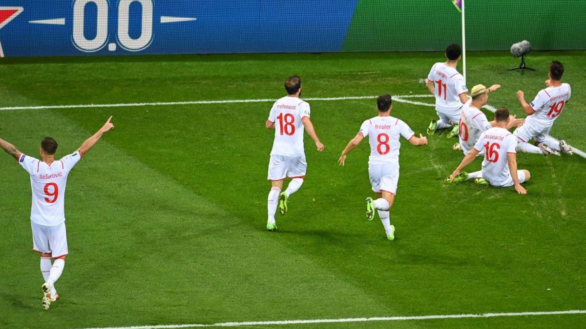 Switzerland celebrate a goal against France