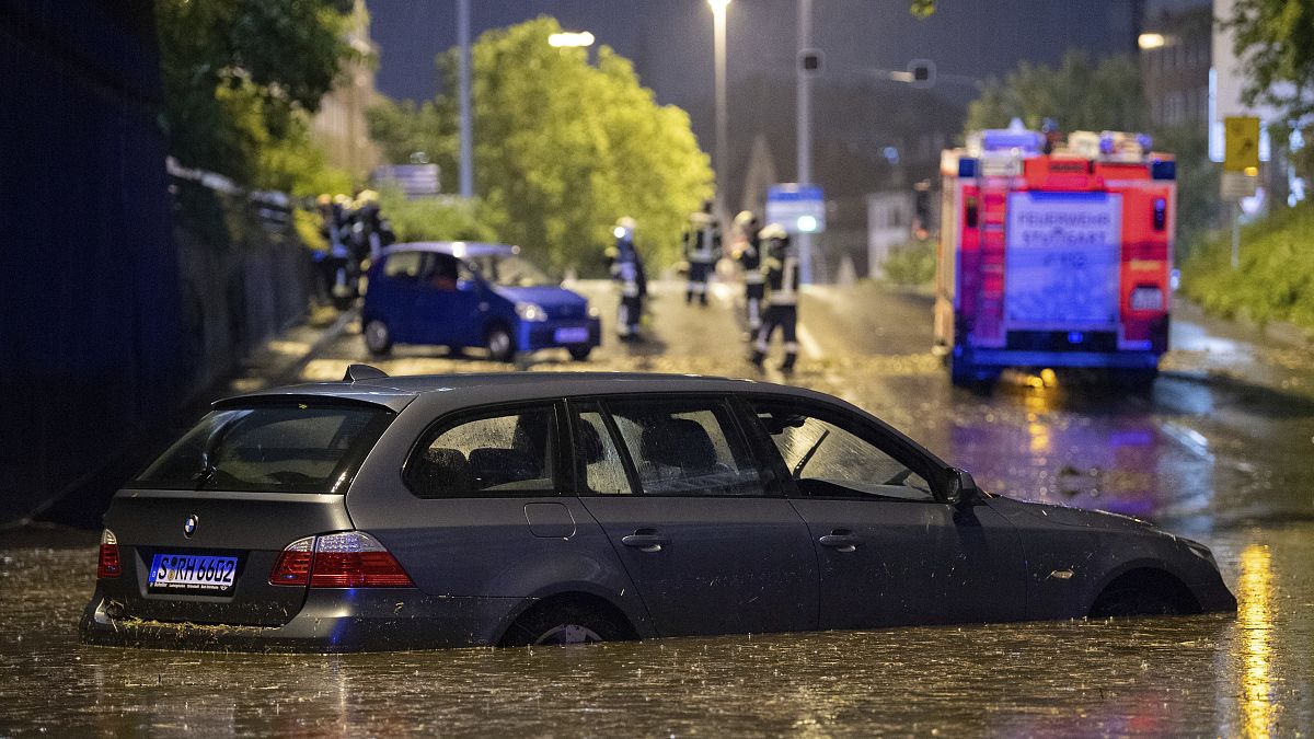 A car stands in the flooded car underpass in Stuttgart, Germany, Monday, June 28, 2021.