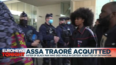  Assa Traoré surrounded by supporters and lawyer in front of the court in Pontoise.