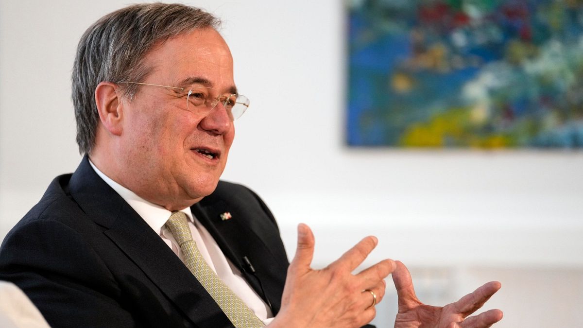 Governor of North Rhine-Westphalia Armin Laschet gestures during an interview with the Associated Press at his office in Duesseldorf, Germany, Wednesday, June 30, 2021. 