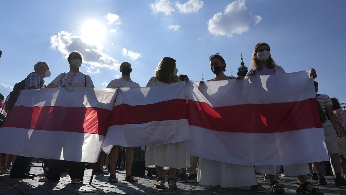 Belarusian opposition activists demonstrating at the Old Town Square in Prague in June.