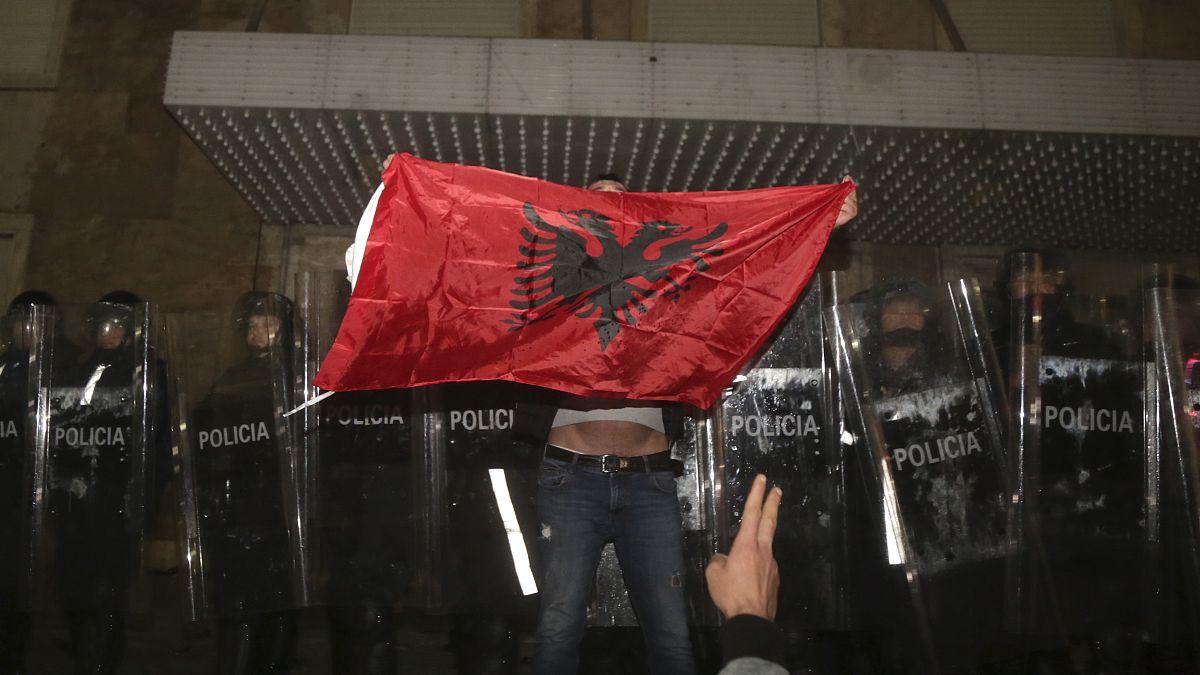 Three senior police officers were among those arrested, Albanian authorities said.