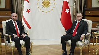 Turkey's President Recep Tayyip Erdogan, right, and Ersin Tatar