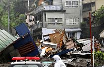 Le case sdistrutte dalla frana, causata dalle forti piogge nel distretto di Izusan ad Atami, in Giappone