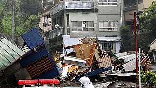 Dozens feared missing after mudslide tears through town in Japan