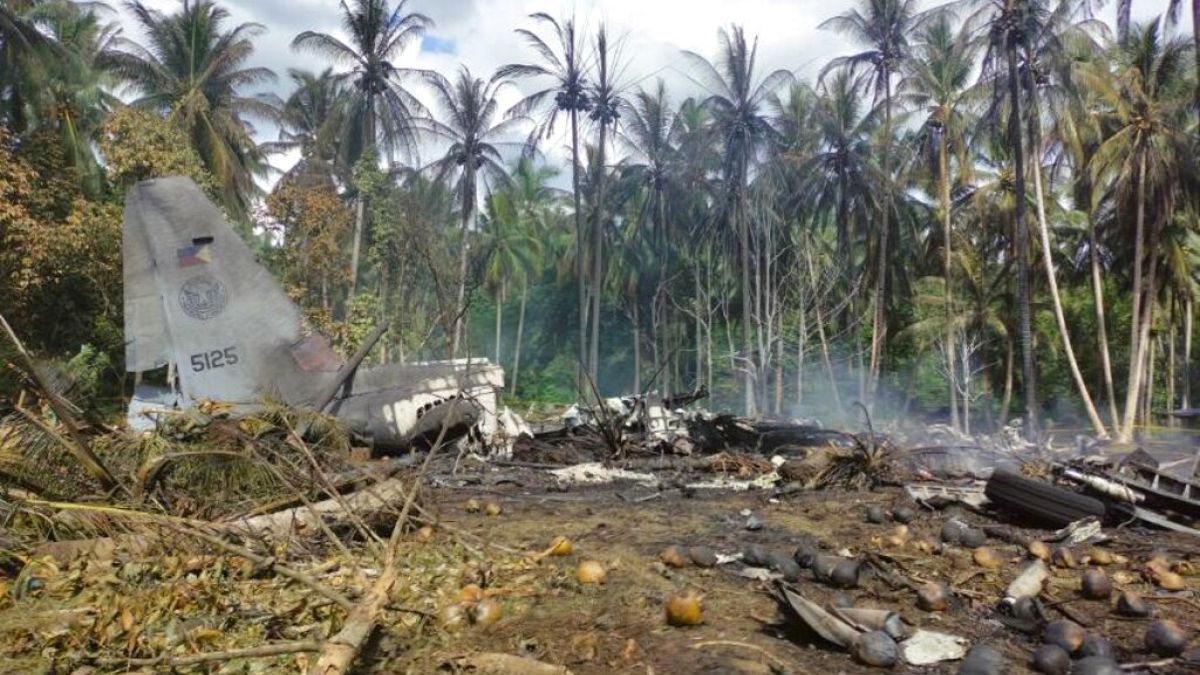 The remains of a Philippine military C-130 plane that crashed in Patikul town, Jolo province, southern Philippines on Sunday, July 4, 2021. 