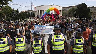 Police protect participants as they take part in the Gay Pride march in Zagreb, Croatia, Saturday, June 18, 2011. 