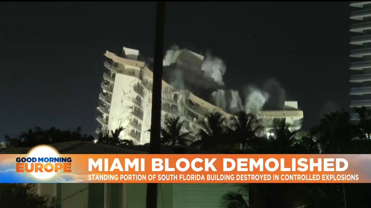 Still-standing portion of collapsed South Florida building being demolished.
