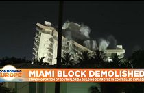 Still-standing portion of collapsed South Florida building being demolished.