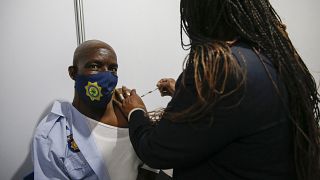 South African police officers receive coronavirus vaccine in Soweto