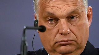 Hungarian Prime Minister Viktor Orban listens to a question during a press conference.