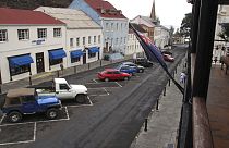 FILE: Vehicles are parked along a neat row in downtown Jamestown, capital of St. Helena island, 2017.