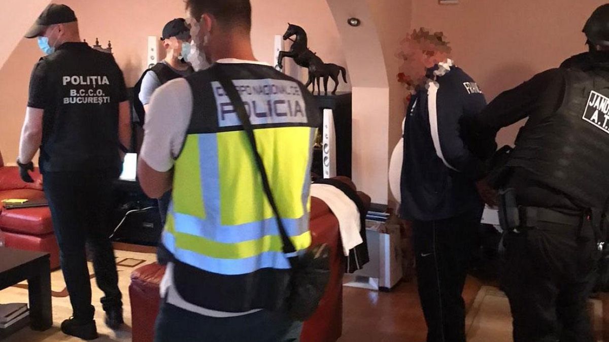 Spanish police raid a premises linked to the criminal gang in February 2021.