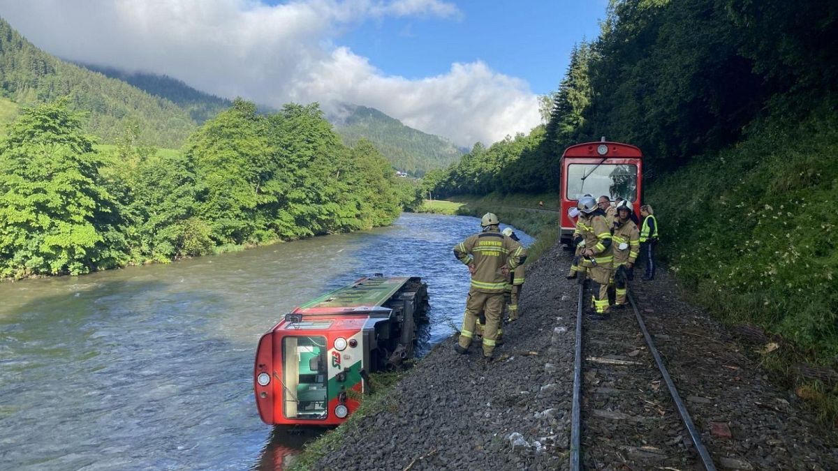 One of the train's crriages had fallen four metres into the river Mur.