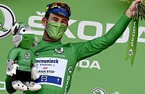 Stage winner Team Deceuninck Quickstep's Mark Cavendish of Great Britain on the podium at the end of the 13th stage of the 108th Tour de France, on July 9, 2021.