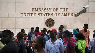 Haitians gather outside the U.S. Embassy in Port-au-Prince