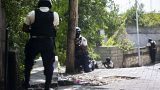 Police search the Morne Calvaire district of Petion Ville for suspects still at large in the murder of Haitian President Jovenel Moise in Port-au-Prince, Haiti, July 9, 2021