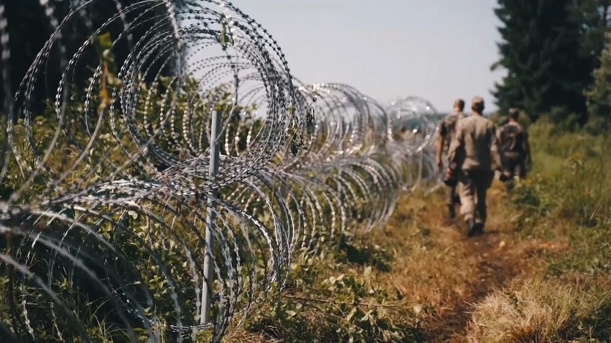 Members of Lithuania's border guard have begun installing a barbed wire fence on the Lithuanian side of the border with Belarus, according to footage released by the Lithuania