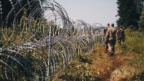 Lithuania border guards erect Belarus border fence