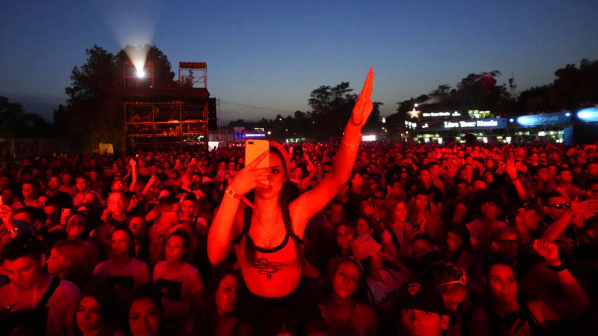 Serbian rock festival goes ahead as partygoers get screened for coronavirus