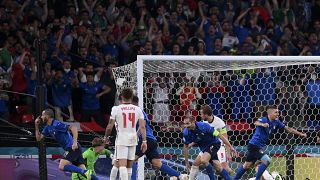 Italy's Leonardo Bonucci, left, celebrates after scoring his side's first goal during the Euro 2020.