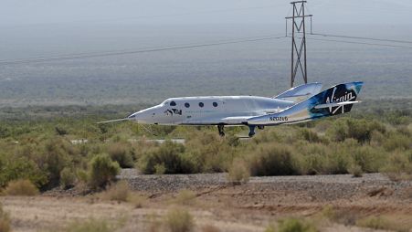 The Virgin Galactic rocket plane, with founder Richard Branson and other crew members on board, lands back in Spaceport America near Truth or Consequences, N.M., July 11, 2021