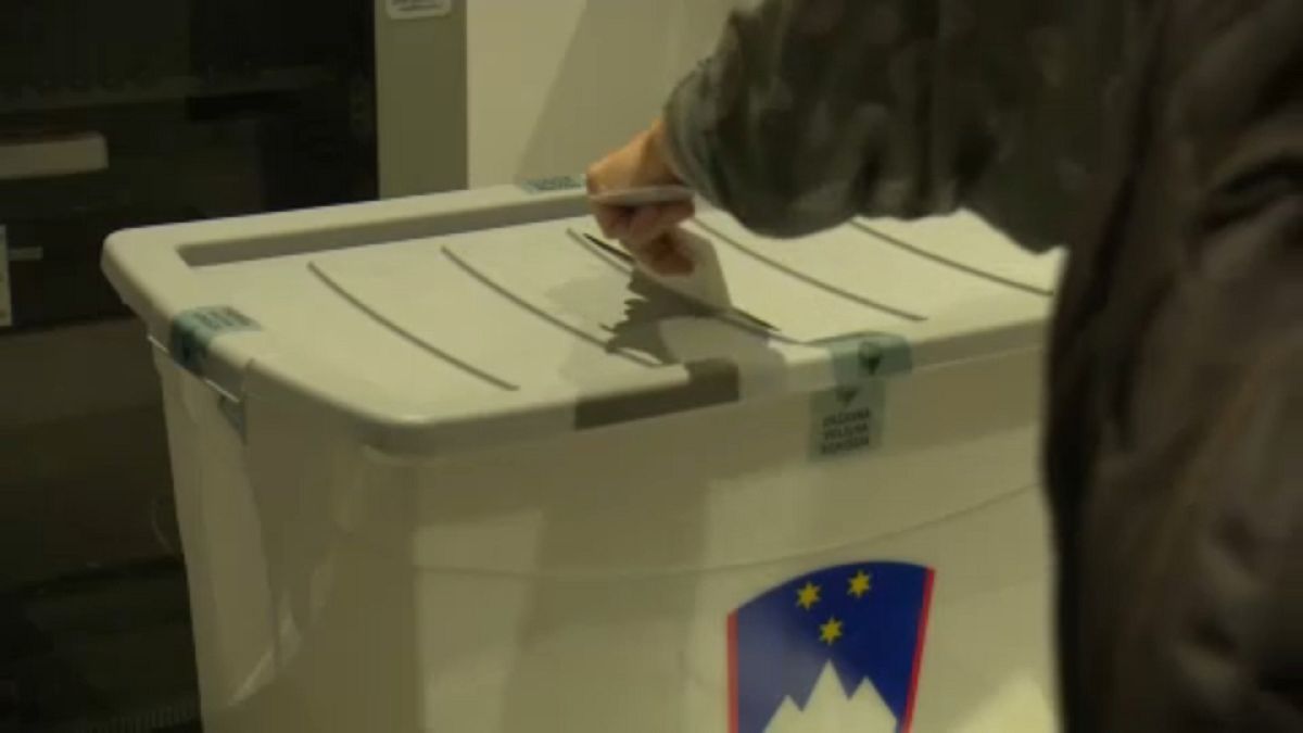 Casting vote in the ballot box, Ljubljana, 11th July 2021.