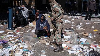 South African police call for end to violent riots as death toll climbs to over 70