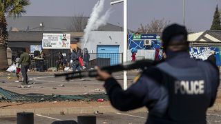 South Africa police minister says they won't allow rioters to make a 'mockery of our democracy'