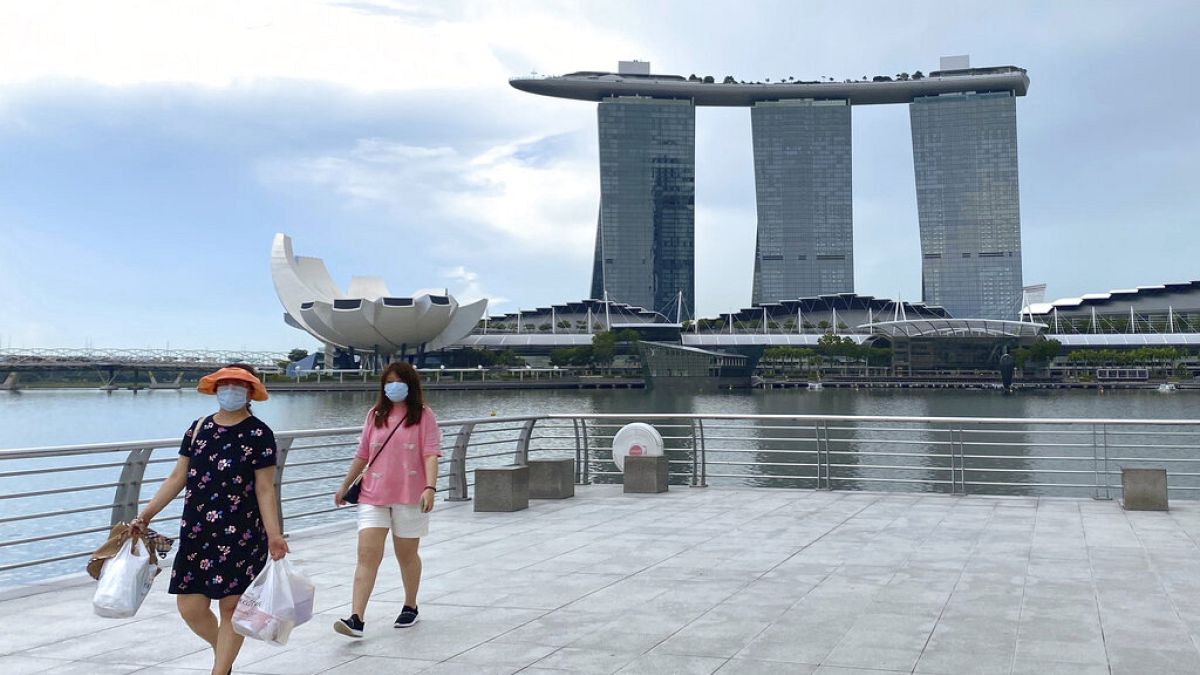 Szingapúri látkép a Merlion Parkkal, háttérben a Marina Bay Sands-el