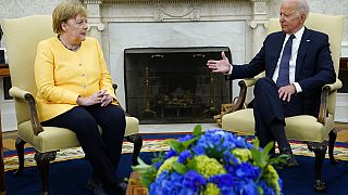 The US president has hosted Angela Merkel at the White House for the final time before she steps down as chancellor