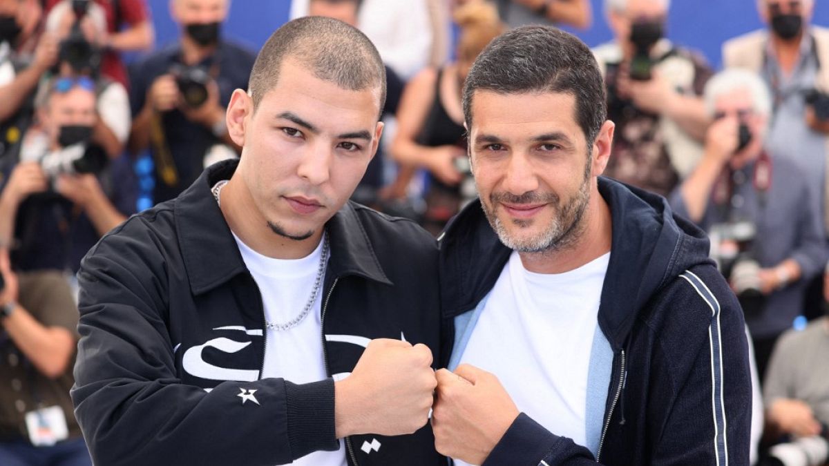 L'acteur principal Anas Basbousi et le réalisateur Nabil Ayouch du film "Haut et fort" à la 74ème édition du Festival de Cannes