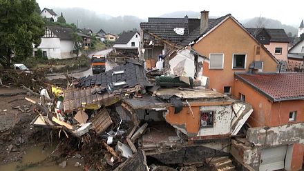 Homes and bridges destroyed after fatal floods sweep Germany