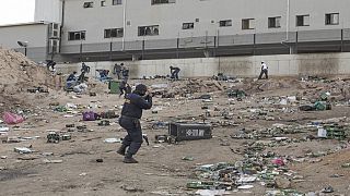 Clashes as looters make a last ditch effort to empty Durban warehouse storing alcohol