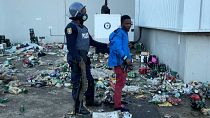Clashes as looters make a last ditch effort to empty Durban warehouse storing alcohol