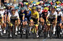 Slovenia's Tadej Pogacar, wearing the overall leader's yellow jersey,  rides with his UAE Team Emirates teammates during the last stage of the Tour de France, 18 July, 2021.