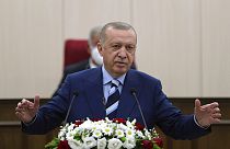 Turkey's President Recep Tayyip Erdogan addresses the Turkish Cypriot parliament in Nicosia as part of a two-day visit on Monday.
