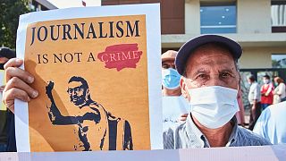 Supporters outside the trial of Moroccan journalist Omar Radi in September 2020. Radi was one of the alleged victims of government spying using Pegasus spyware. 