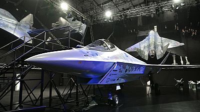 Russia unveils new war plane, Putin hails air power