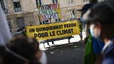 Des militants écologistes à Paris le 20 juillet 2021