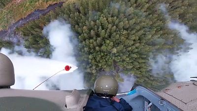 Army helicopters fight forest fires in northwestern Russia