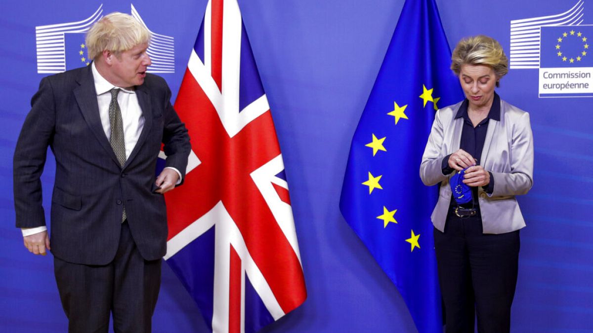 European Commission President Ursula von der Leyen welcomes British Prime Minister Boris Johnson prior to a meeting at EU headquarters.