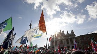 A flag of the Italian League party is seen at a 2019 political rally in Rome.